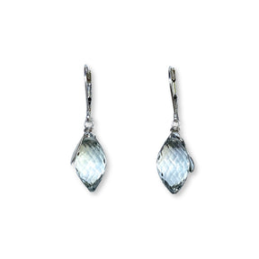 These elegant earrings feature marquise Prasiolite stones, also known as green amethyst, showcasing a light mint green hue with excellent cut and polish. Each highly faceted stone dangles gracefully, accented with delicate silver leaves, capturing the perfect blend of natural beauty and refined craftsmanship.